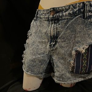 Forever 21 acid washed ripped Jean shorts.